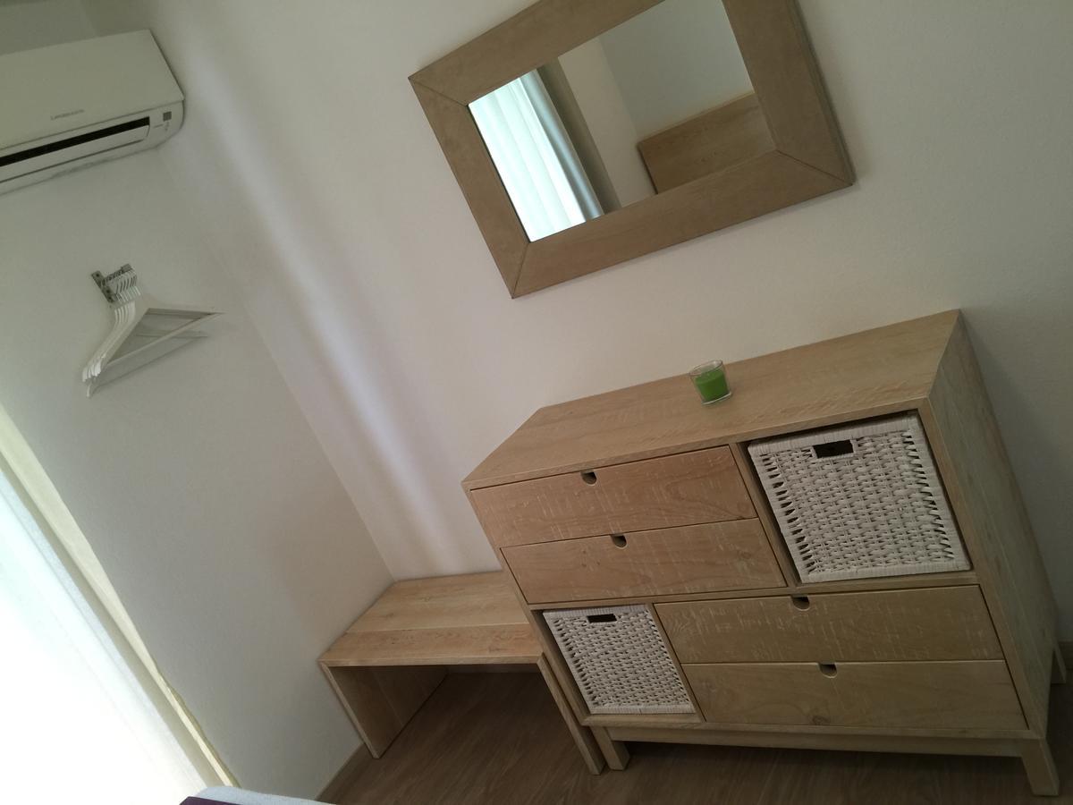 Apartamentos Delfin Es Caló Buitenkant foto