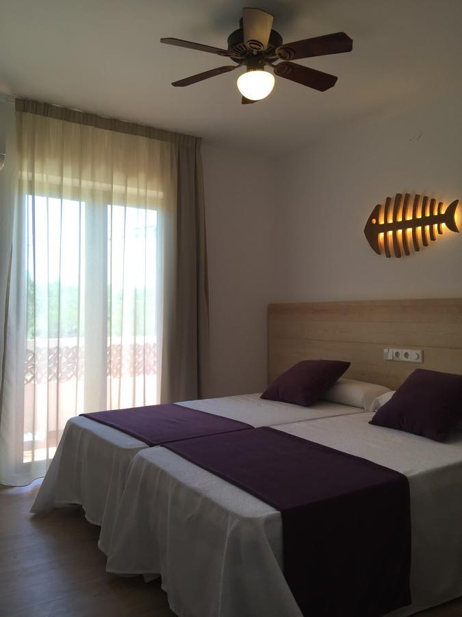 Apartamentos Delfin Es Caló Buitenkant foto