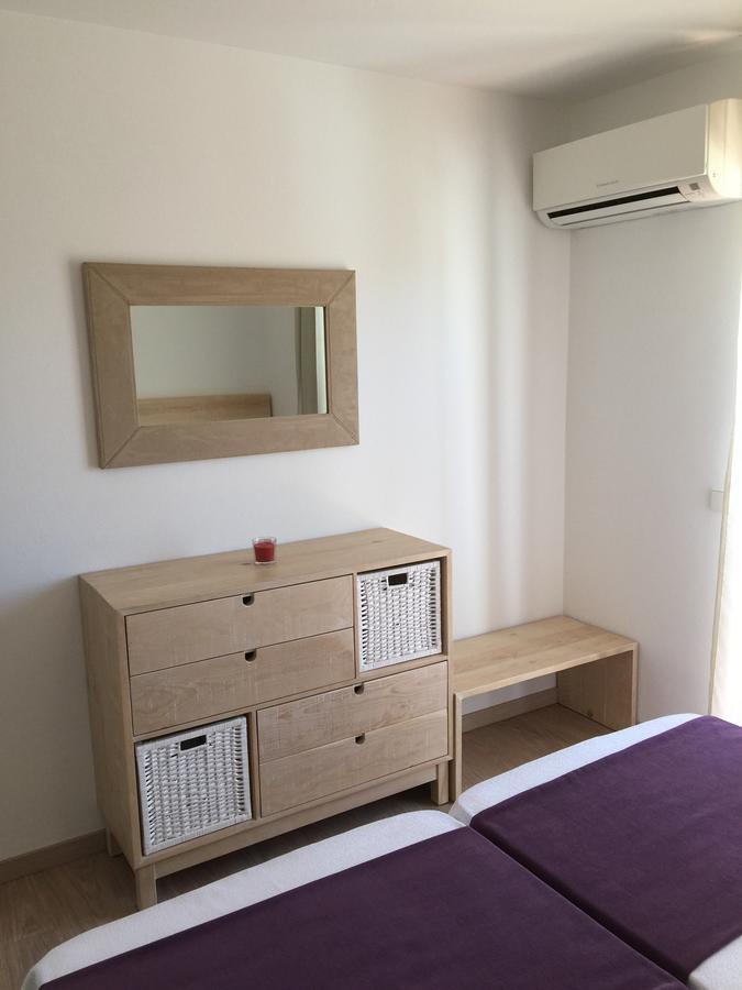 Apartamentos Delfin Es Caló Buitenkant foto